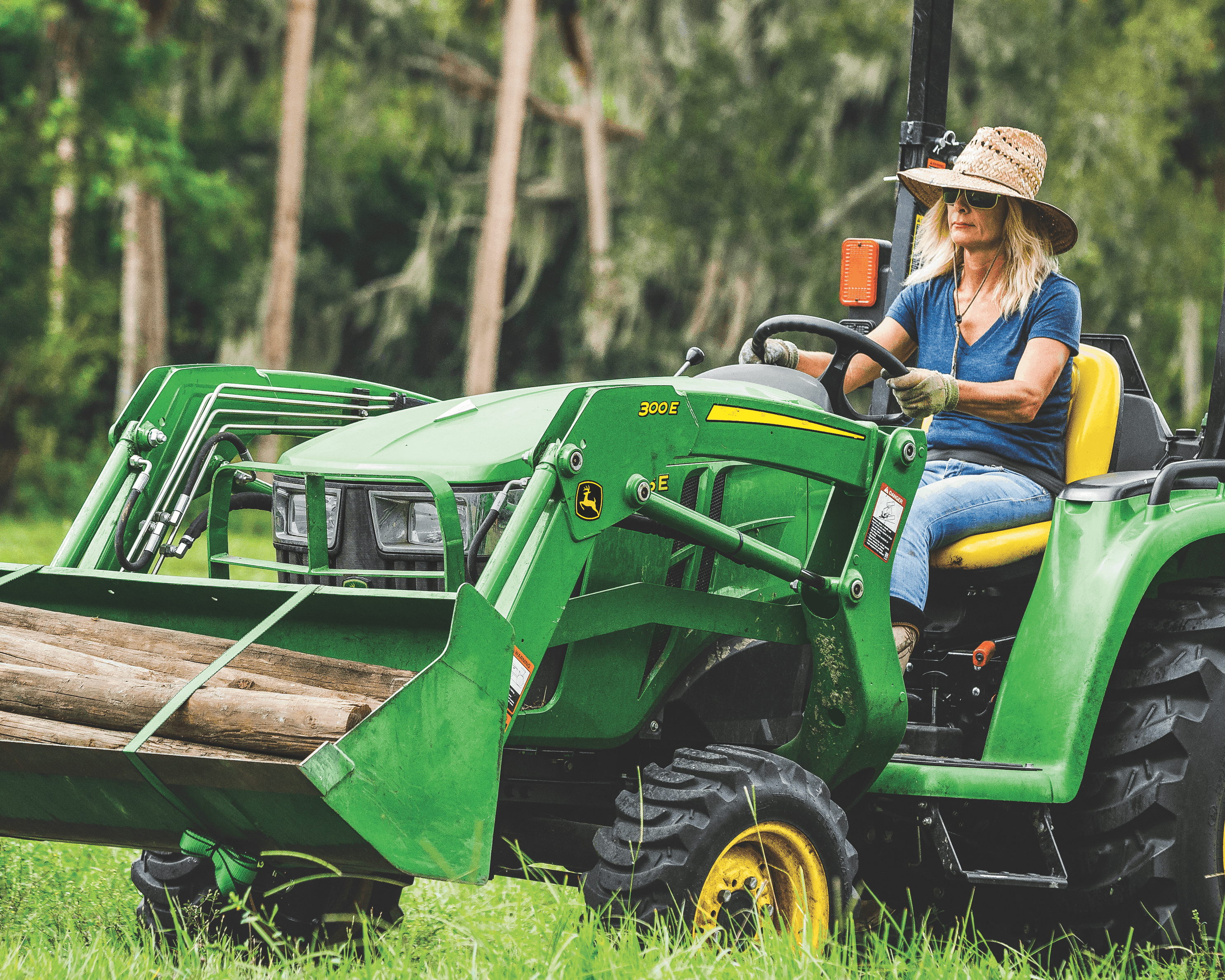 John Deere 3025E with 300E Loader
